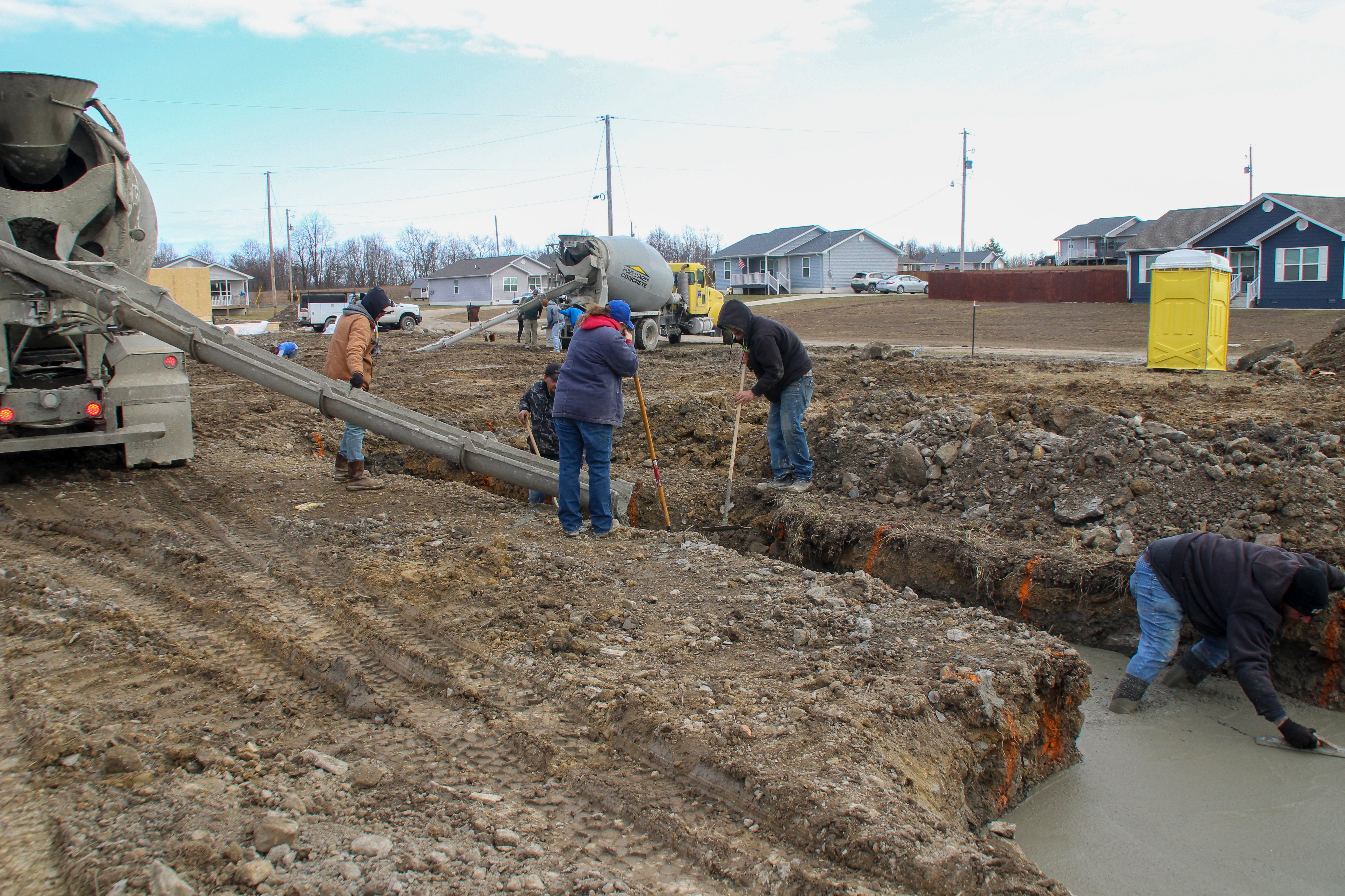 HDA crews digging footers for two new houses