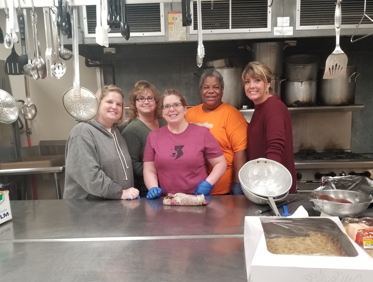 Pictured from left to right are KHC staff volunteers: Sara, Jennifer, Deanna, Reida, and Charla.